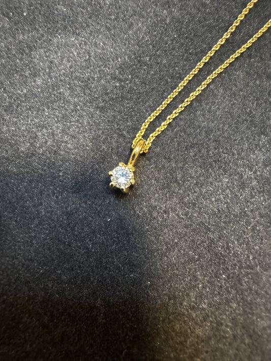 14 kt guldvedhæng med 0,10 ct